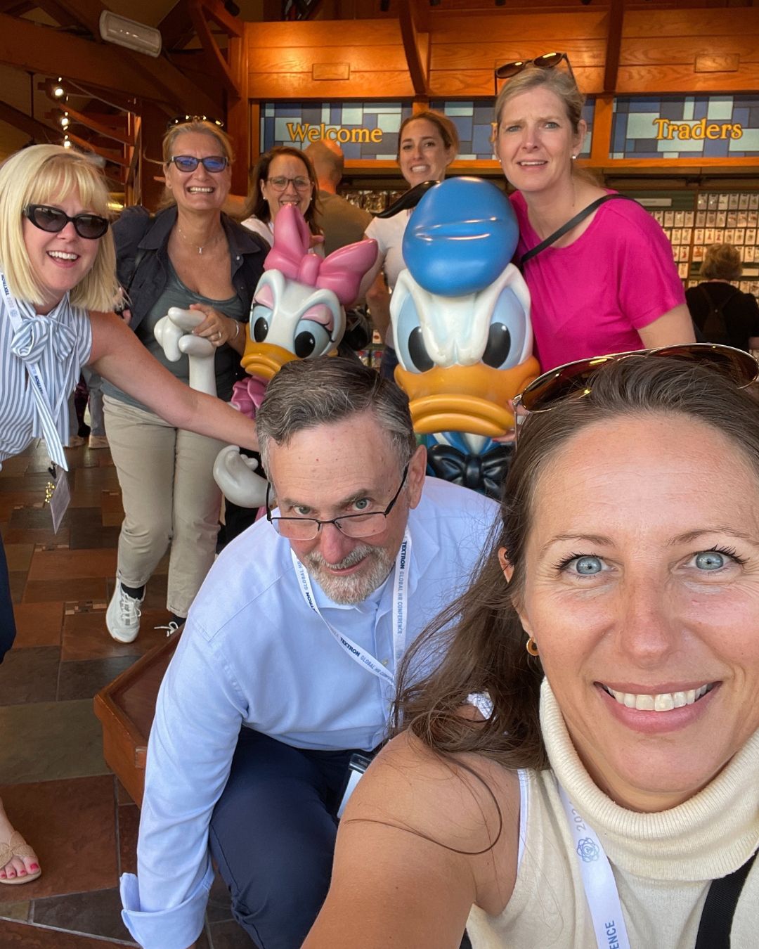 scavenger-hunts-for-orlando-corporate-teams Corporate team collaborating on an interactive game at Disney Springs.